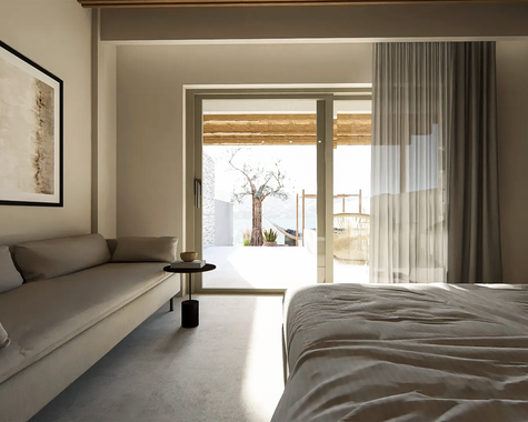 Schlafzimmer mit Doppelbett, Sofa und großem Fenster