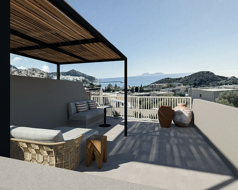 Rooftop-Terrasse mit Loungemöbeln und Panoramablick auf Meer und Hügel